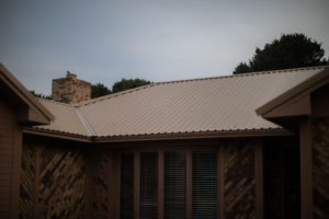 tan metal roof in Portales